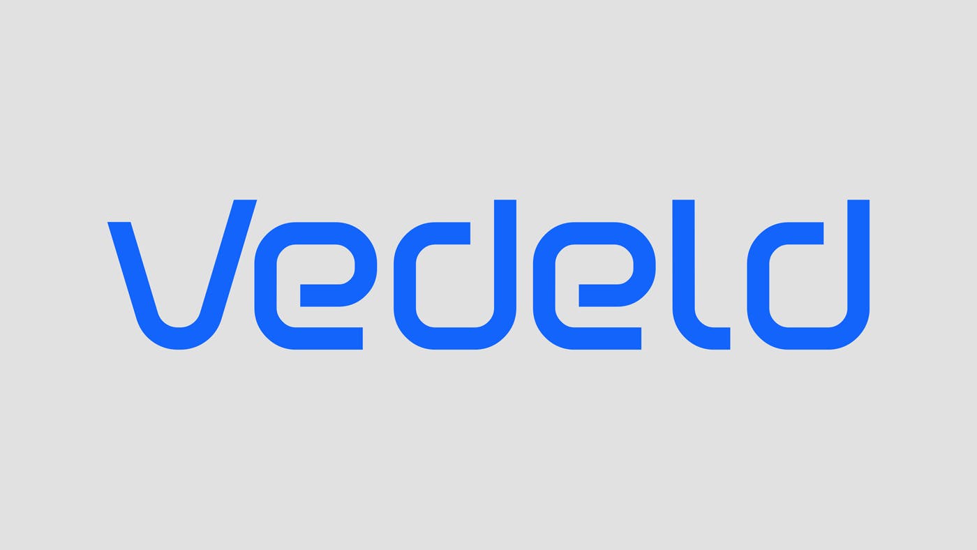 Vedeld logo blueongrey